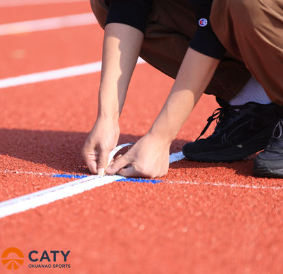 Superfícies de pista de corrida para o exterior sem costura Material da pista de corrida de 400 m Granulados EPDM com instalação de pista atlética